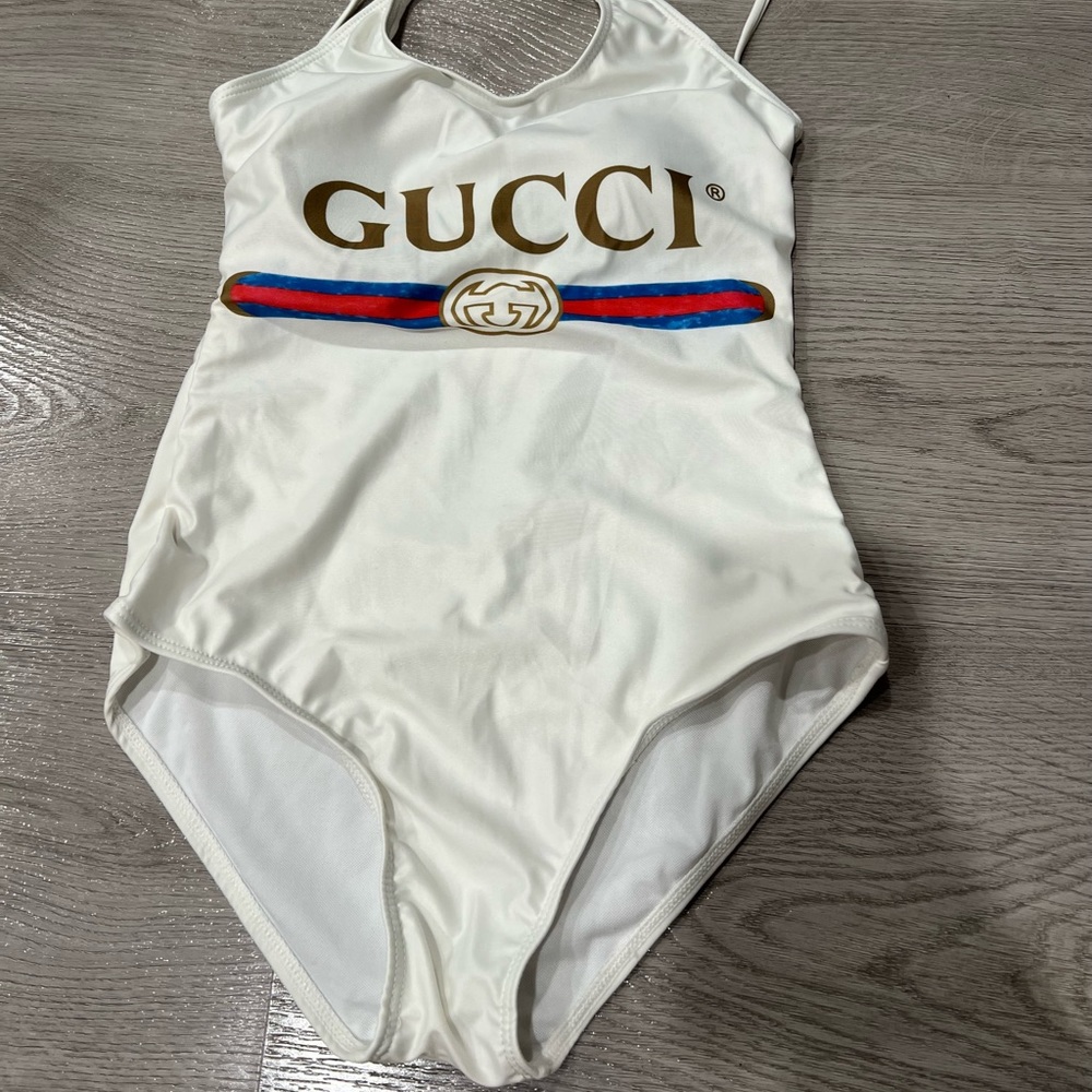 Luxury bathing suit size L fits as a M